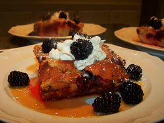 French toast with marmalade, whipped cream, and berries