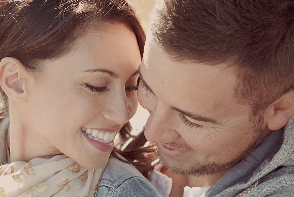 couple smiling at each other