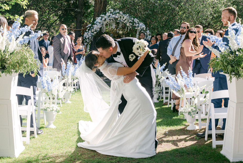 Bride and groom kissing