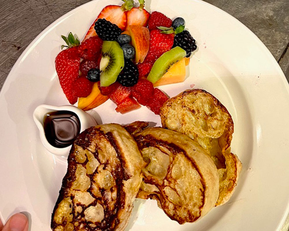 French toast with fruit and syrup
