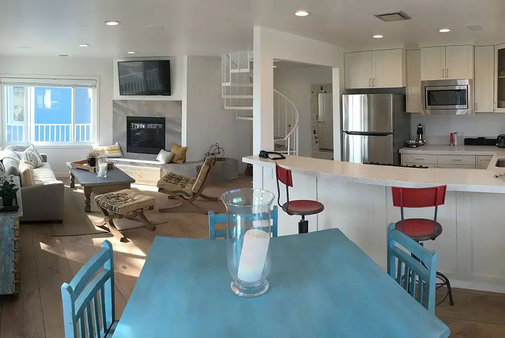 Open concept interior with kitchen and living room