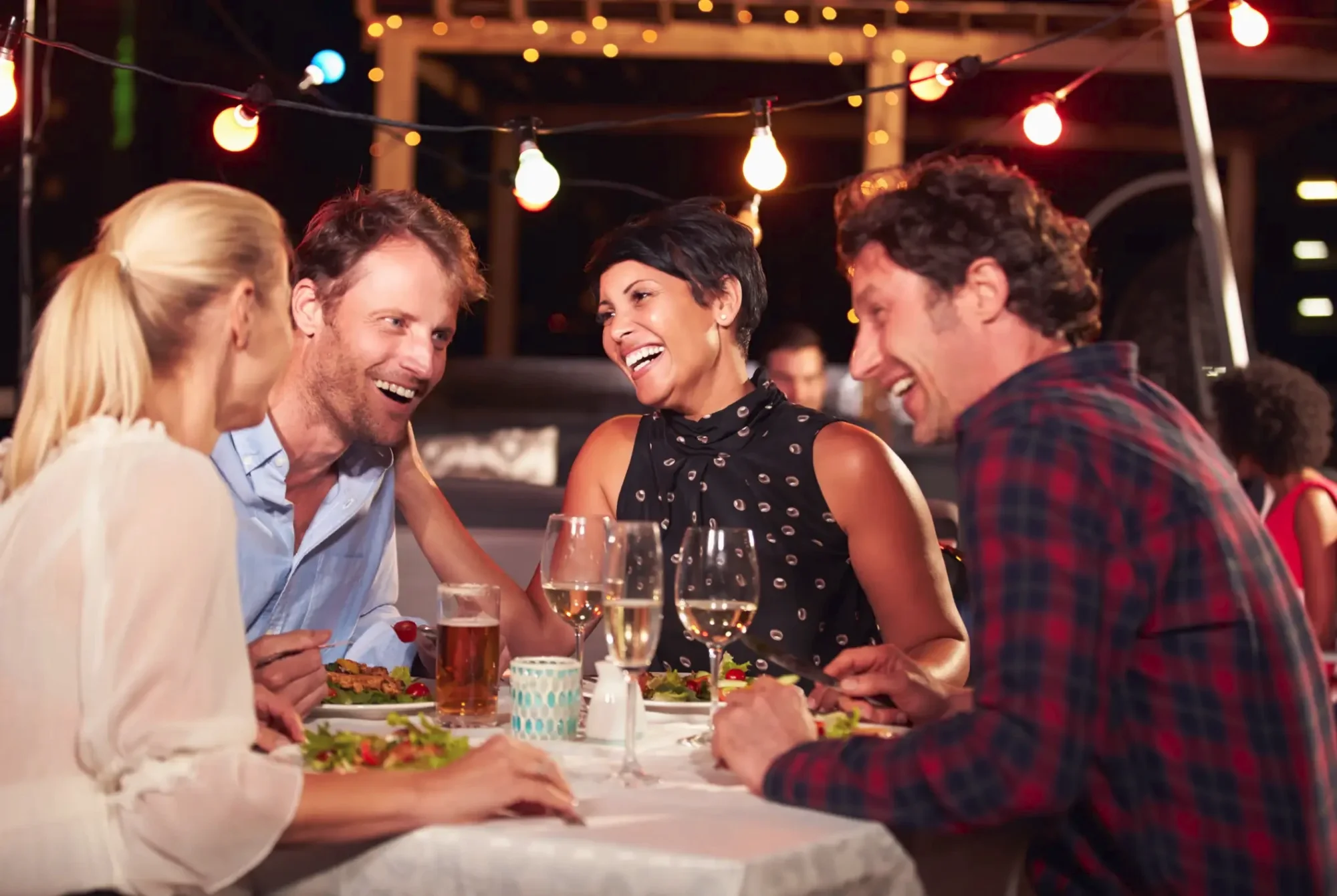 Two couples at dinner
