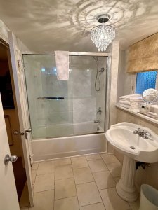 bathroom sink with tub and shower