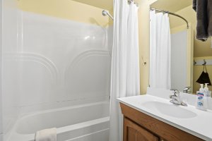 Bathroom with tub and shower