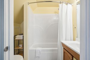 Bathroom with tub and shower