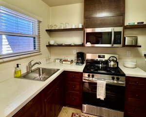 Kitchen with range and microwave