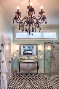 chandelier, sink, and shower