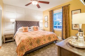 king bed and ceiling fan