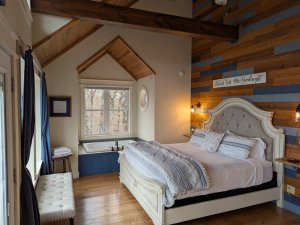 bed against wood wall