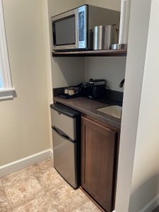 Bathtub next to shower in bathroom