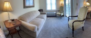 King-sized bed in middle of room