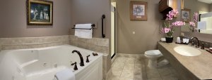 Sink countertop next to doorway to bathroom