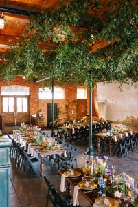 Seats at long decorated banquet table 