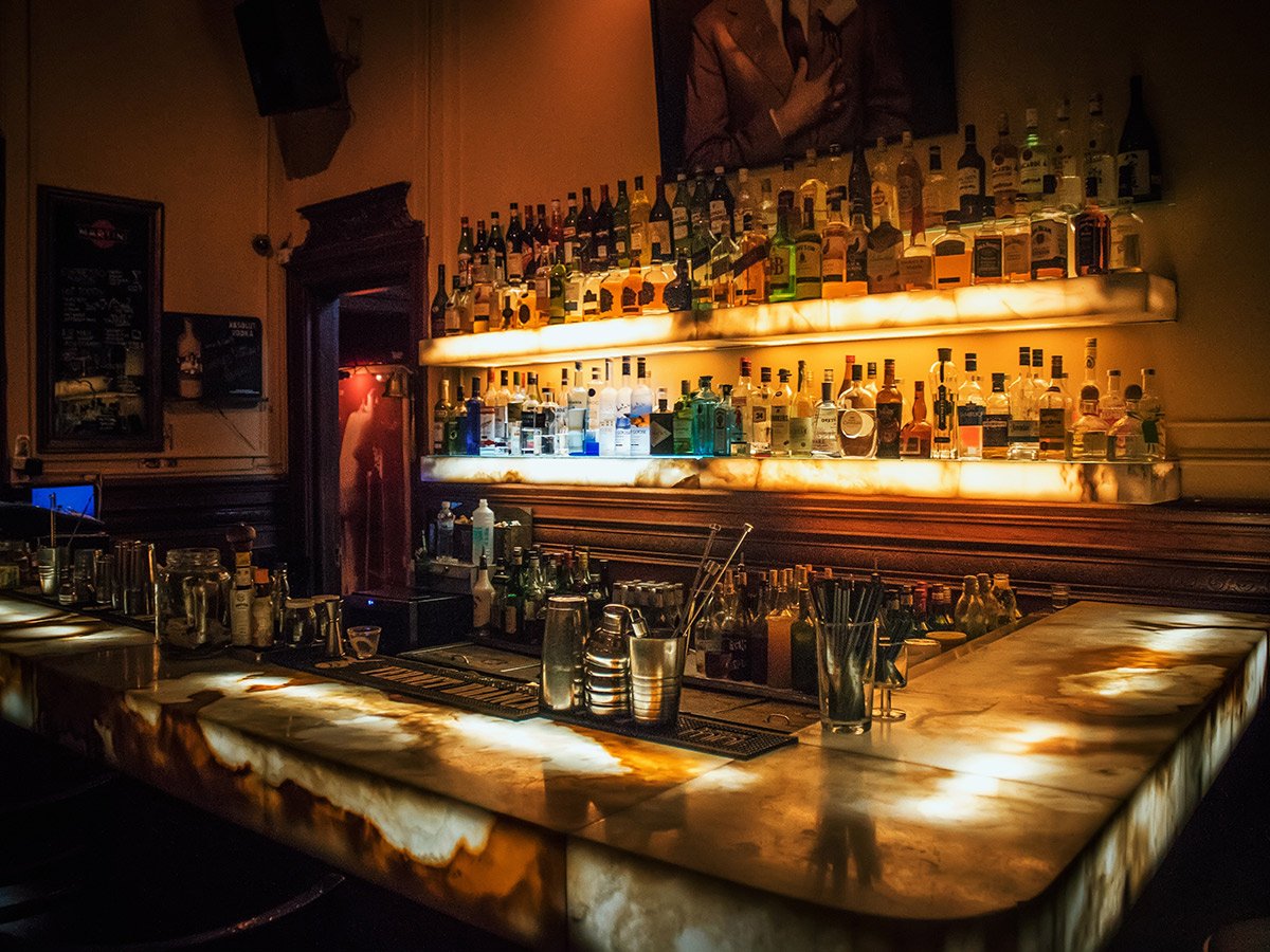 rustic bar with bottles lined up