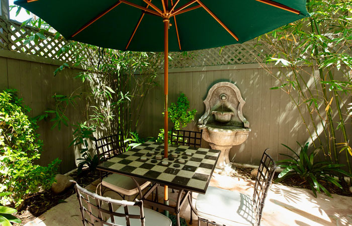 Colorful patio with chairs and table